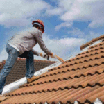 How can looking for standing water stains on parapet walls reveal how rain moves across the roof?