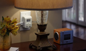 How can using a simple timer plug for lights make a home look occupied when you’re away