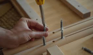 What benefit is there in tightening loose screws on handles and hinges before they completely fail?