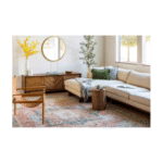 What difference does deciding carpet or rug sizes based on furniture layout make to room comfort